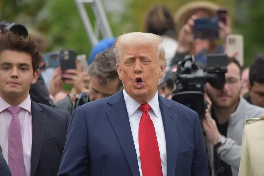 President Trump cheers during the egg roll.jpg
