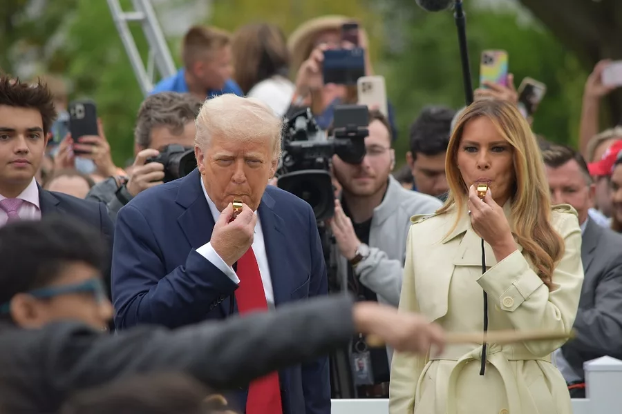 The Trumps blow the whistle to start the Easter Egg Roll.jpg