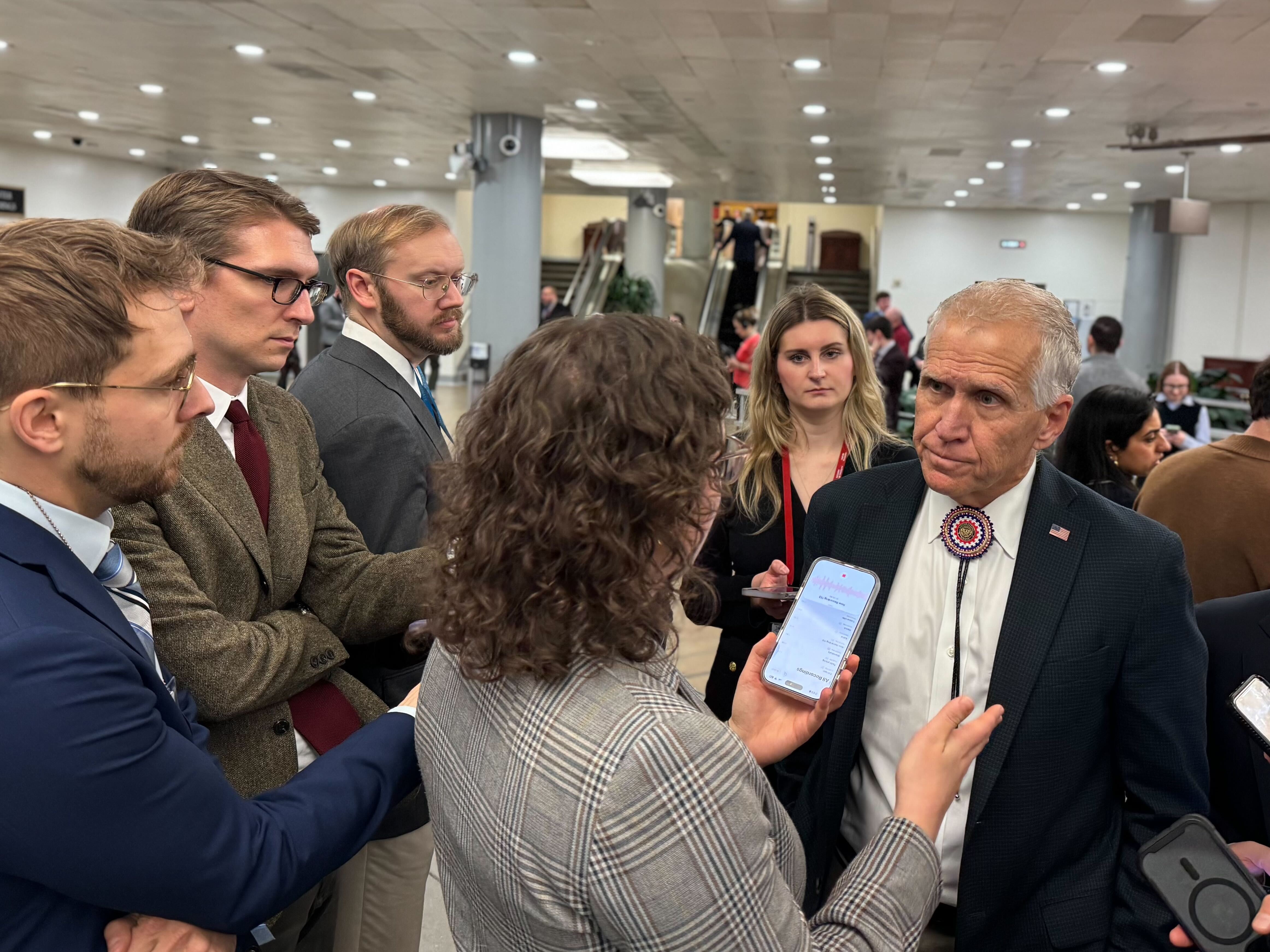 Sen. Tillis and reporters.jpg