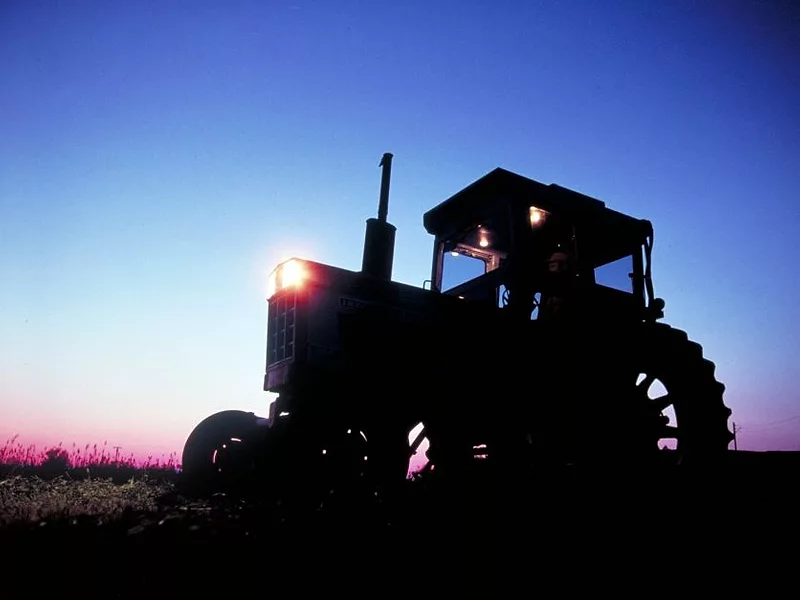sun-rising-over-tractor-USDA-flickr-photo.jpg
