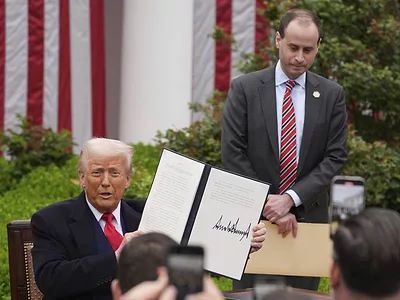 trump-with-tariffs-4-02-25-AP.jpg