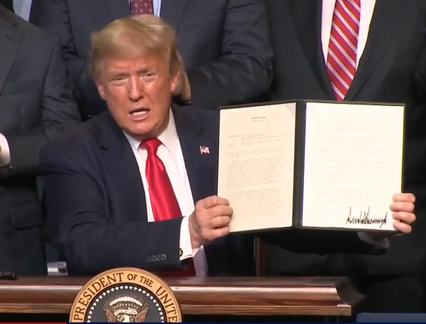 Trump signs memo