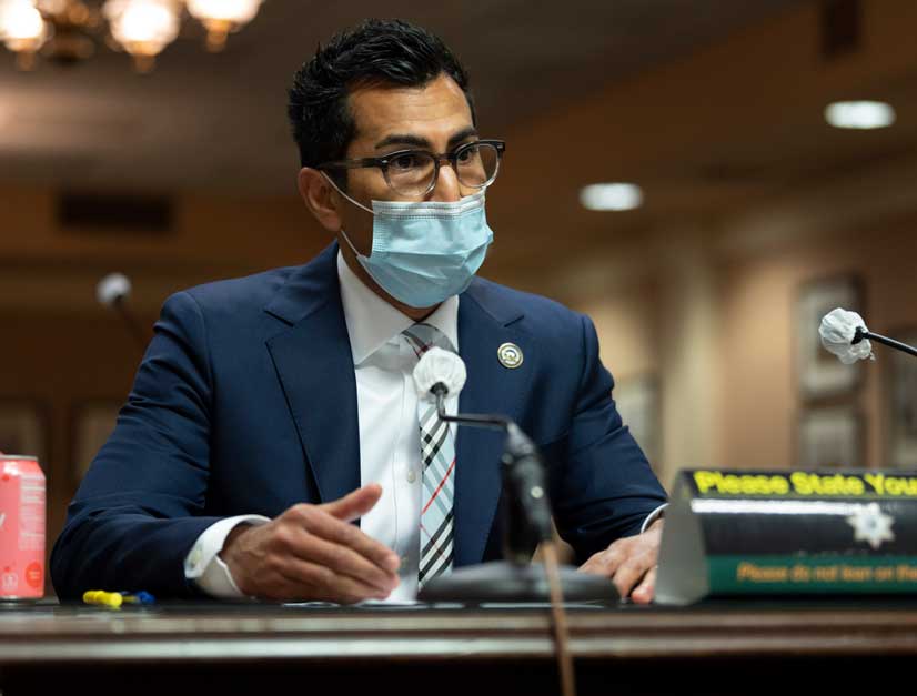 Rivas in a policy hearing