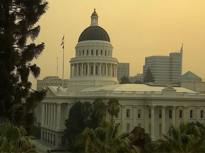 California capitol under smoke haze