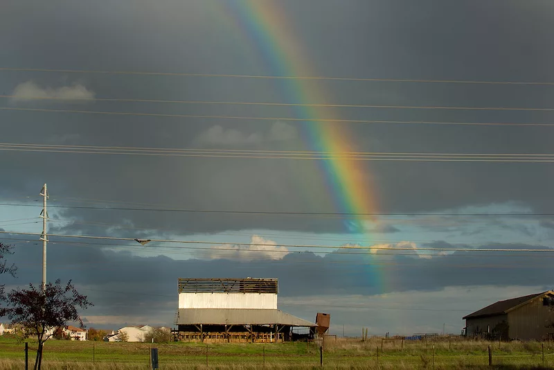 rainbow over a farm