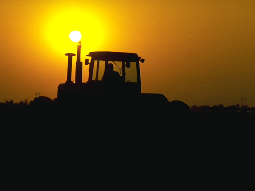 Tractor at sunset