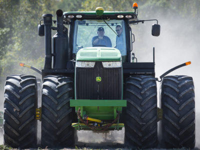 Sonny Perdue driving a tractor