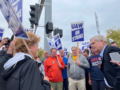 Vilsack with protesting union workers
