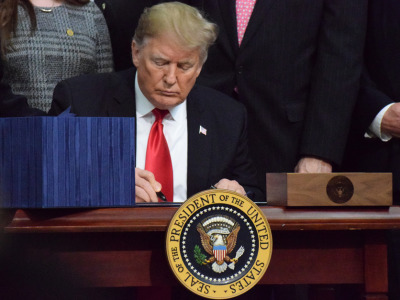 Trump signing the farm bill