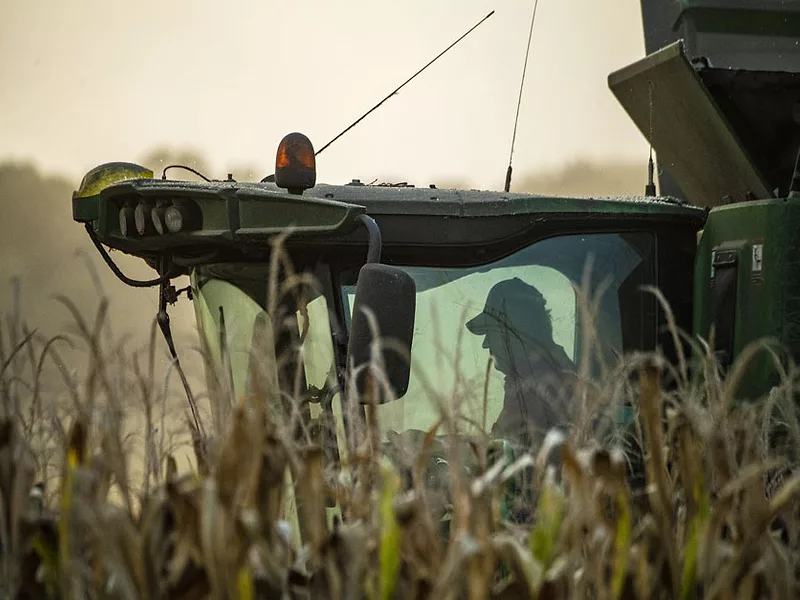 USDA-farmer-in-harvester.jpg