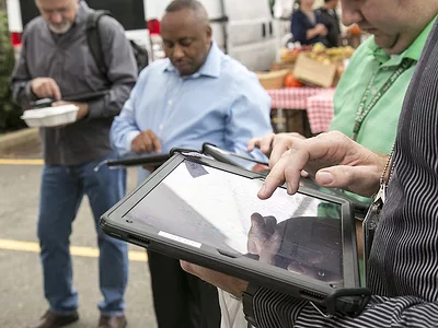 People on iPads