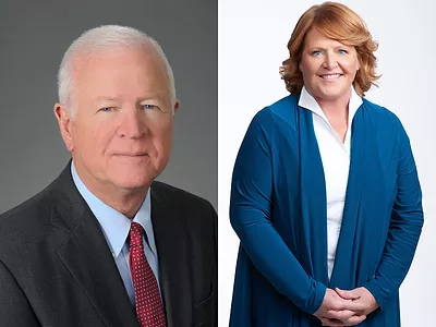 Sens. Saxby Chambliss and Heidi Heitkamp .png